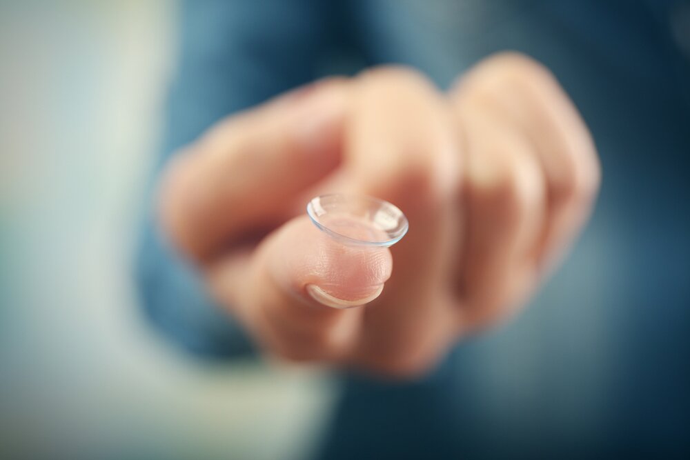 Woman excited for her new Scleral Lenses.